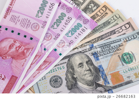 2000 rupee banknote over US dollar banknote. 2000 rupee banknote over US dollar banknote. 26682163