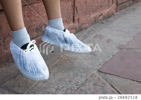 Visitors wear disposable socks inside Taj Mahal. Visitors wear disposable socks inside Taj Mahal. 26682518