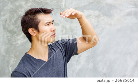 Man protect his eyes from sunlight. 26685014