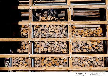 Piled up firewood 26686897