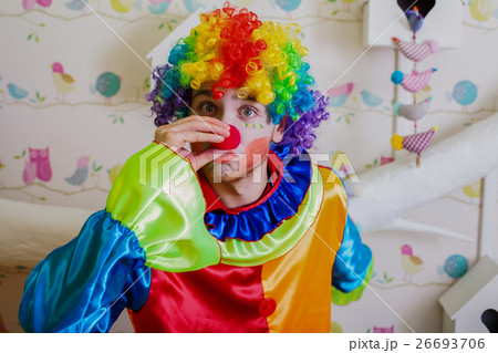 Clown pushes himself on the nose. Clown pushes himself on the nose. 26693706