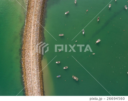 Aerophotography view from above breakwaters boat. 26694560