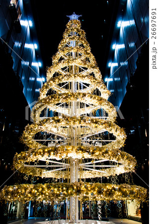 Decorated gold and yellow Christmas tree Decorated gold and yellow Christmas tree 26697691