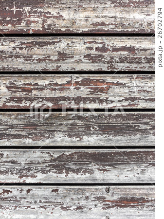 Wood surface with peeling paint 26702794