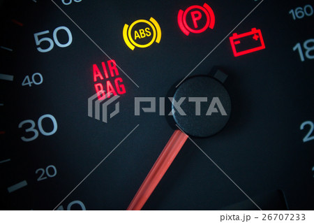 Airbag warning light. Car dashboard in closeup 26707233