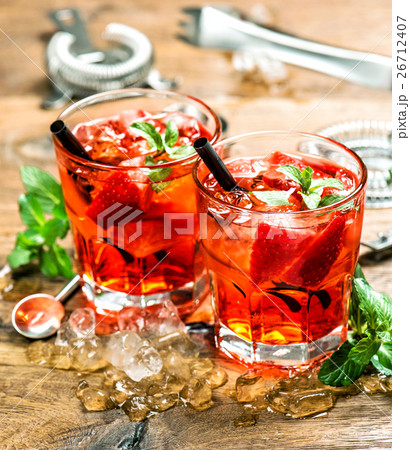 Party drinks with ice and juice. Cocktail making Party drinks with ice and juice. Cocktail making 26712407