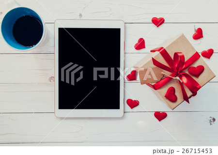 Top view (above) gift box and red ribbon 26715453