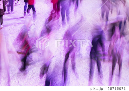 Blurred ice rink with people in evening time 26716071