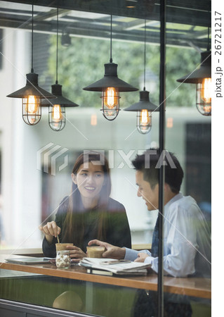 Asian business people meeting in a cafe. 26721217