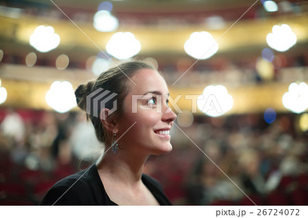 Portrait of woman in auditorium of theatre . Portrait of woman in auditorium of theatre . 26724072