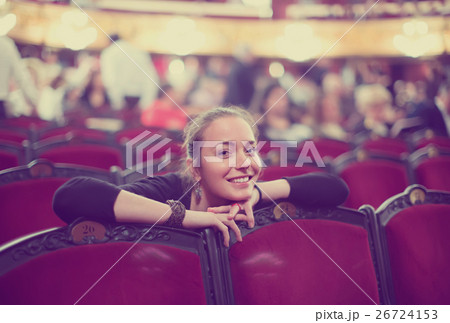 Portrait of woman in auditorium of theatre . 26724153