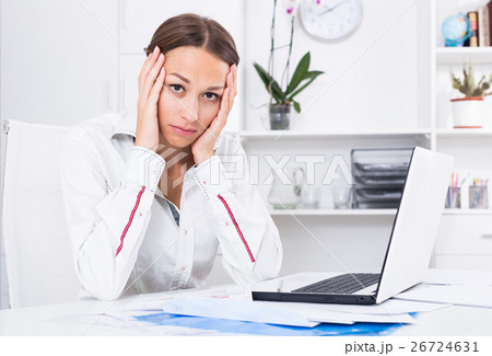 sad woman working 26724631