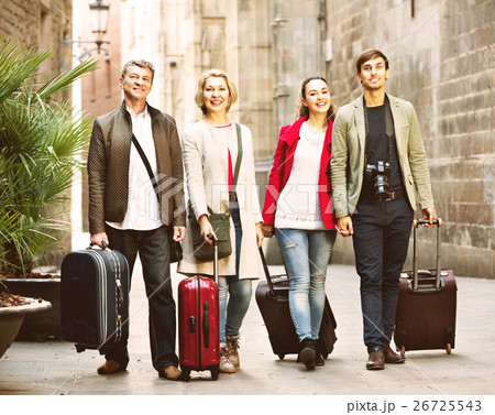 Portrait of young and mature couple with baggage Portrait of young and mature couple with baggage 26725543