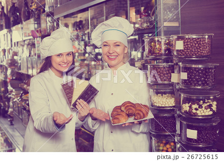 Women selling fine chocolates 26725615