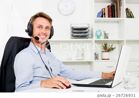 Man talking using hands-free set 26726931