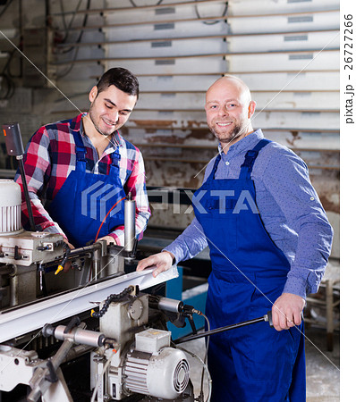 workers near milling machine workers near milling machine 26727266
