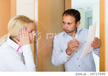 Collector getting the arrears from woman 26727696