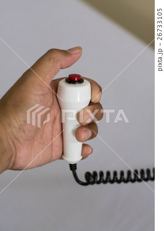 hand pushing nurse call button hand pushing nurse call button 26733105