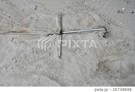 Anchor in the sand on the beach Anchor in the sand on the beach 26738698