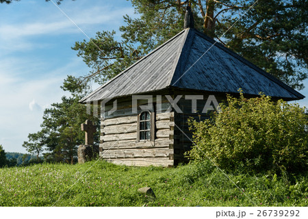 The small wooden house on grass hill with a copy 26739292
