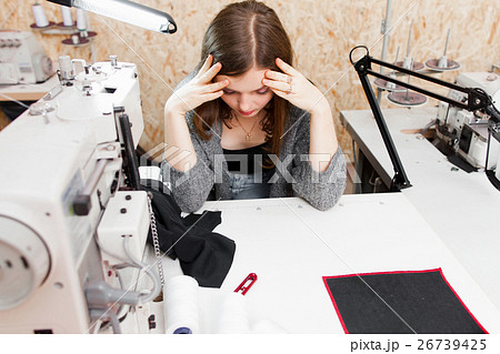Seamstress realized she made mistake, copy space Seamstress realized she made mistake, copy space 26739425