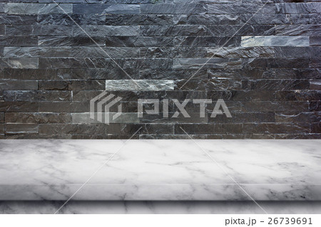 Empty marble table on black marble stone wall. 26739691
