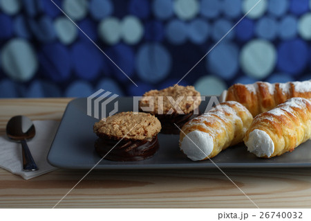 Sweet tube and coconut cookies filled jam cover Sweet tube and coconut cookies filled jam cover 26740032