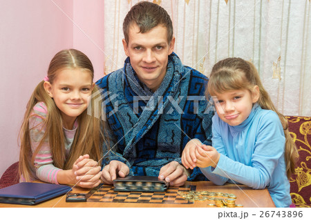 Pope shows children his collection of coins, all together looked in the frame Pope shows children his collection of coins, all together looked in the frame 26743896