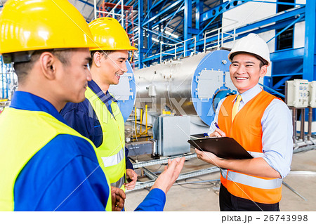 Asian factory worker and engineer as team Asian factory worker and engineer as team 26743998