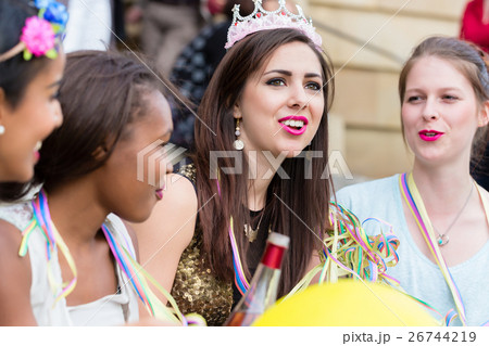 Girls having drink together on bachelorette party 26744219