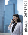 Asian businesswoman talking on smart phone. 26747404