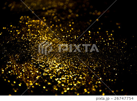 gold glitter lights on black background. 26747754