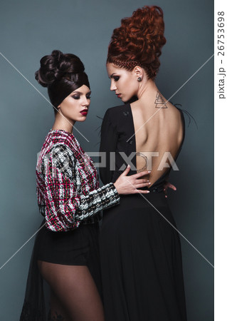 Beautiful girls in evening dress with avant-garde 26753698