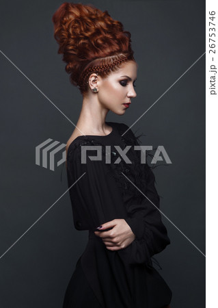 Beautiful girl in evening dress with avant-garde 26753746