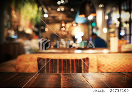 Wooden table in a cafe on the background Wooden table in a cafe on the background 26757100