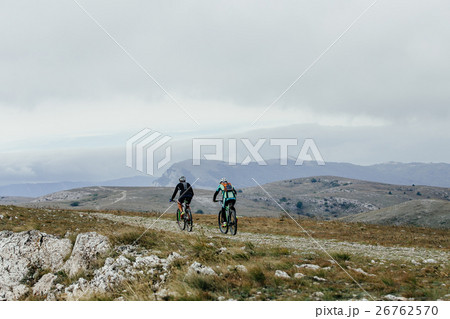 two athletes cyclists two athletes cyclists 26762570