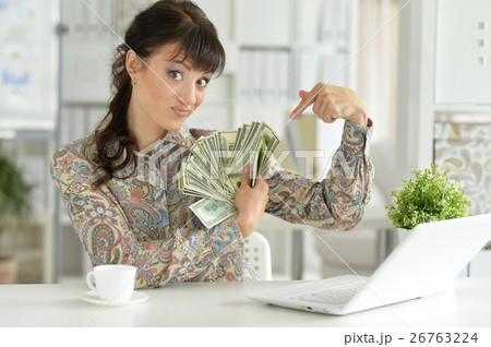 Young woman with money Young woman with money 26763224