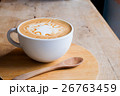 caramel coffee in white cup on wood table 26763459