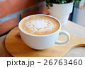 caramel coffee in white cup on wood table 26763460