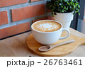 caramel coffee in white cup on wood table 26763461