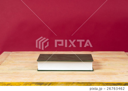 Book on wooden table. Back to school. Copy space 26763462