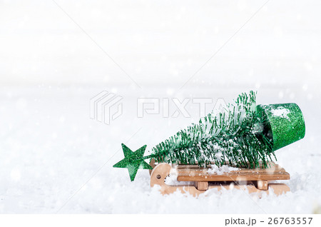 wooden winter sleigh carrying a small Christmas wooden winter sleigh carrying a small Christmas 26763557