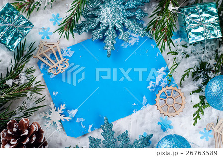 Christmas card with decorated fir tree on snow. 26763589