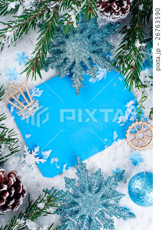 Christmas card with decorated fir tree on snow. 26763590