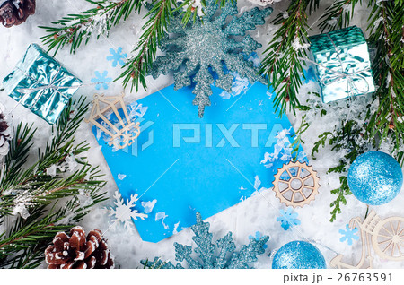 Christmas card with decorated fir tree on snow. 26763591