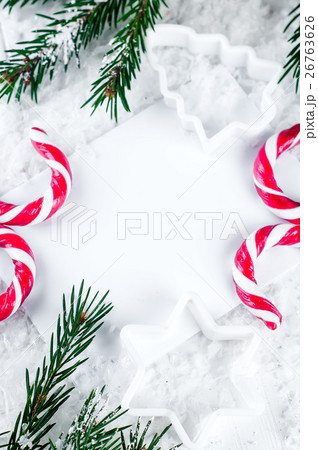Clear paper laying with candy cane. Clear paper laying with candy cane. 26763626