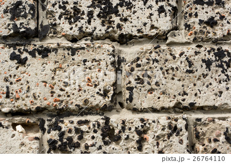 Wall made of concrete blocks, stained black resin Wall made of concrete blocks, stained black resin 26764110