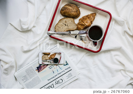 Coffee Americano Espresso Newspaper Breakfast in Bed Concept 26767060