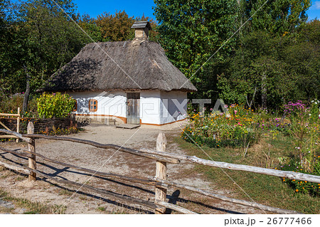 Retro ukrainian cottage with thatched roof 26777466