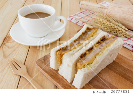 Katsu Sando on wooden table background, Closed up Katsu Sando on wooden table background, Closed up 26777851